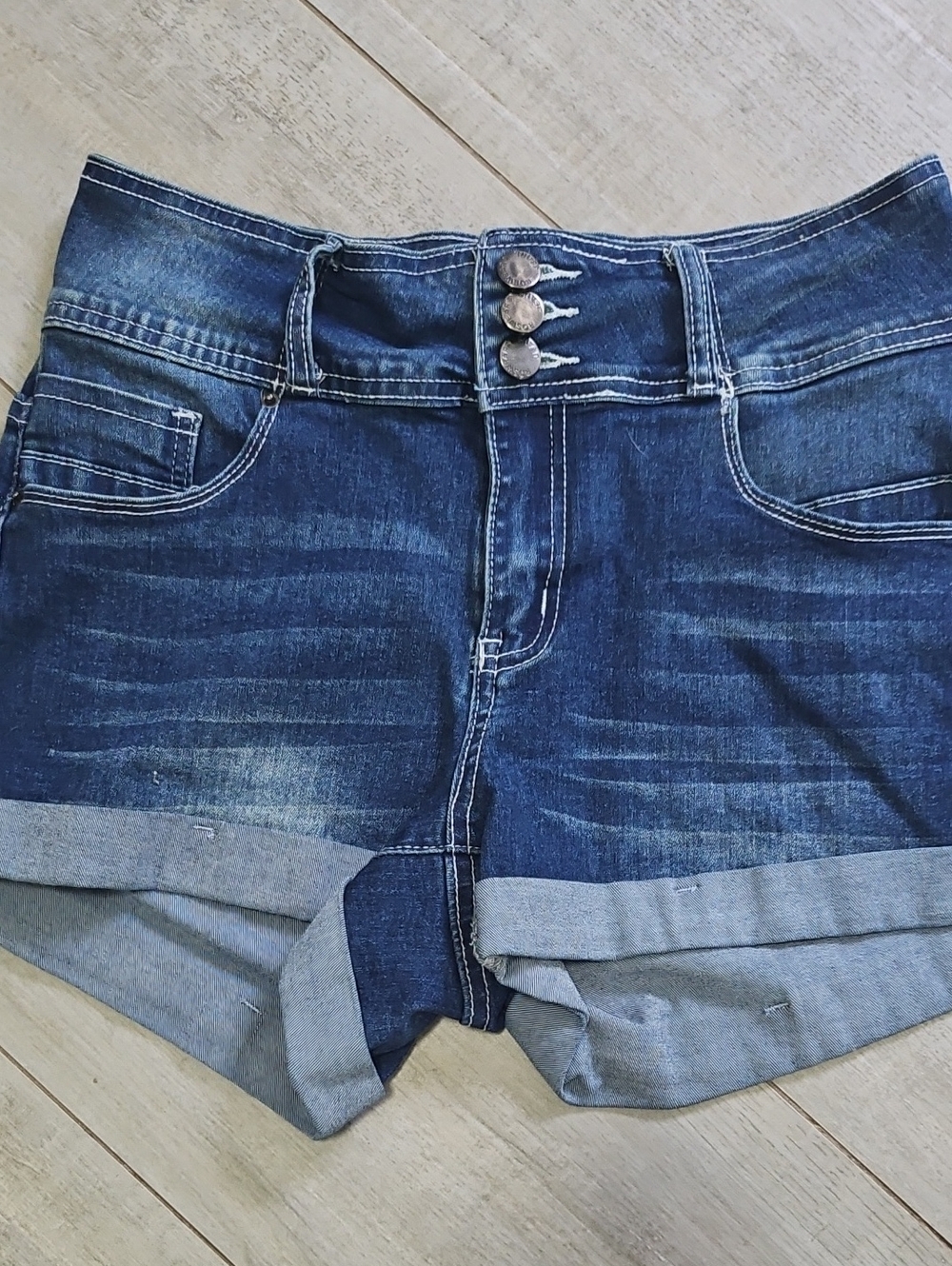 High-Rise Dark Blue Denim Cuffed Shorts with Triple Button Front